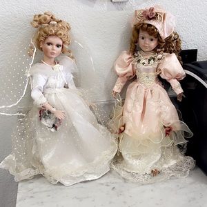 2 porcelain dollies in perfect condition